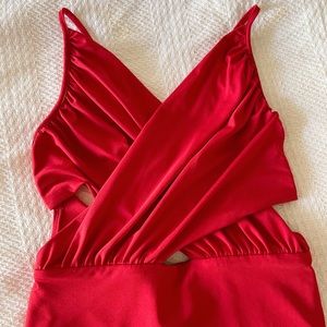 Hello Molly Red Backless Mini Dress

Preloved red show stopper dress. Worn once